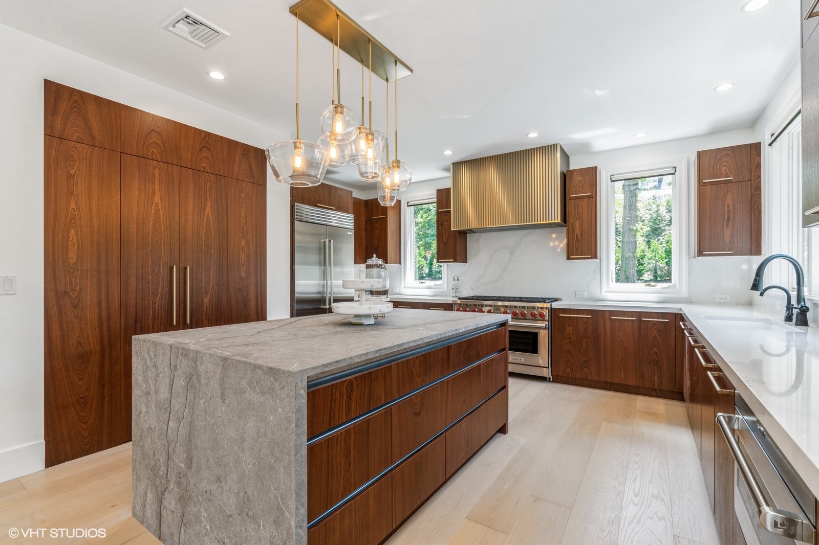 Custom walnut cabinetry and kitchen millwork